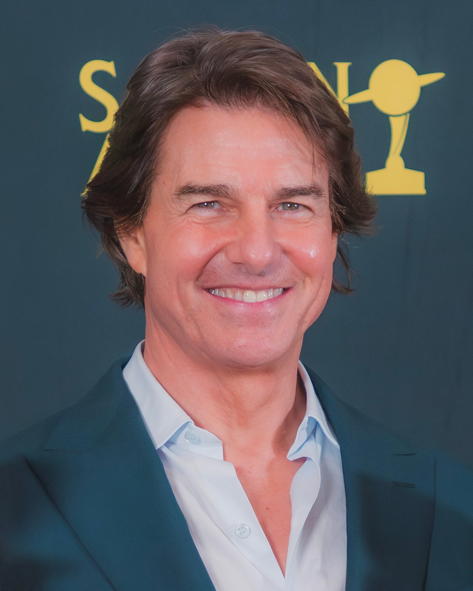 Tom Cruise smiling on the red carpet at the 53rd Saturn Awards in 2026