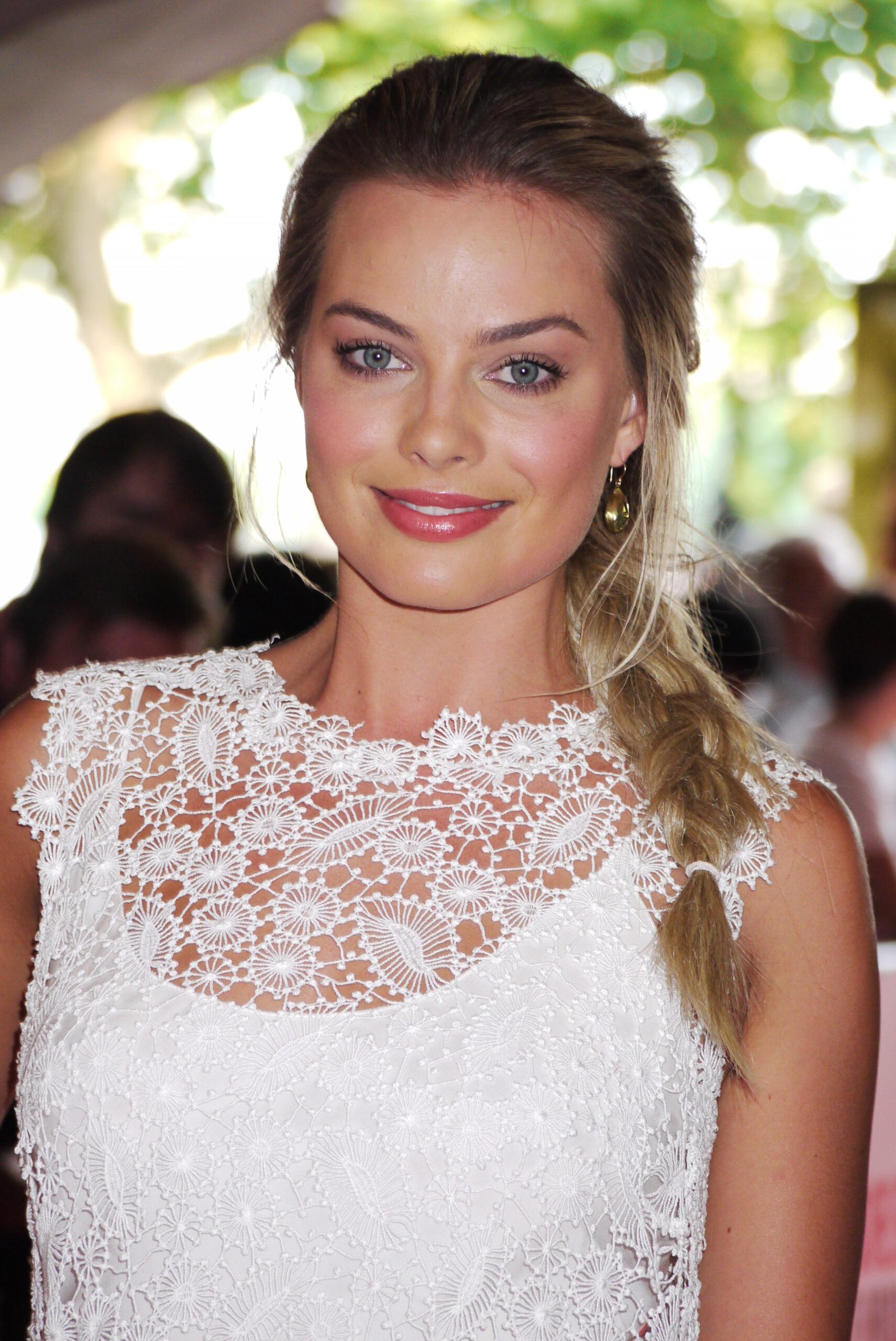 Margot Robbie in a white lace dress at Somerset House in London in 2013