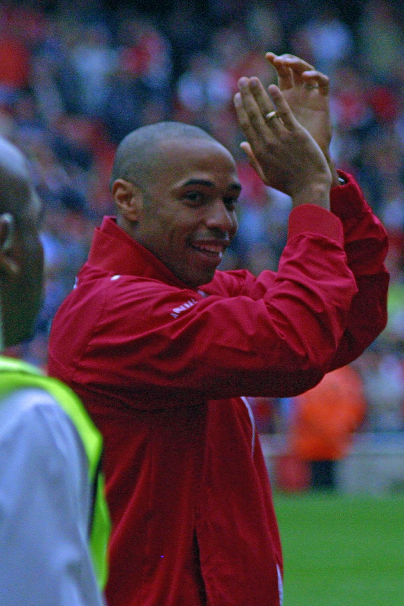Thierry Henry applauding Arsenal fans in 2007.